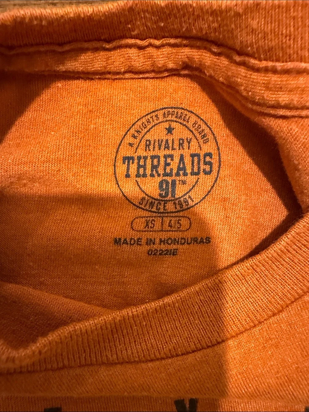 Rivalry Threads bright orange